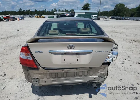 2003 Toyota Camry Le z USA, uszkodzony, nr VIN 4T1BE32K33U182277